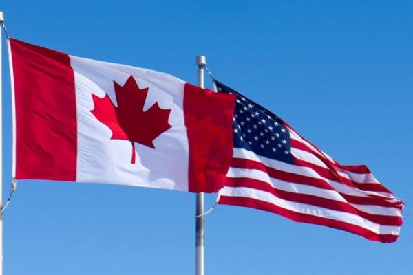 Canadian and American flags