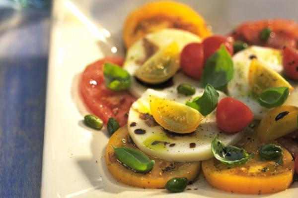 marinated cheese salad with pistachios and tomatoes