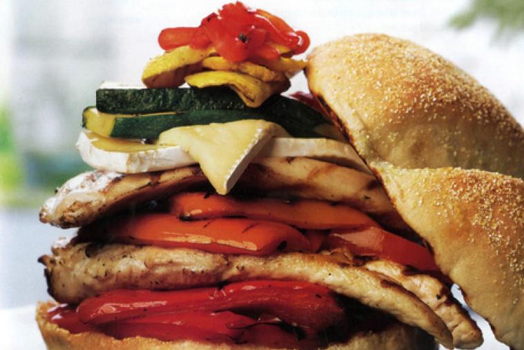 chicken burger with grilled vegetables and brie