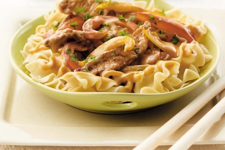 pork and sweet peppers on noodles